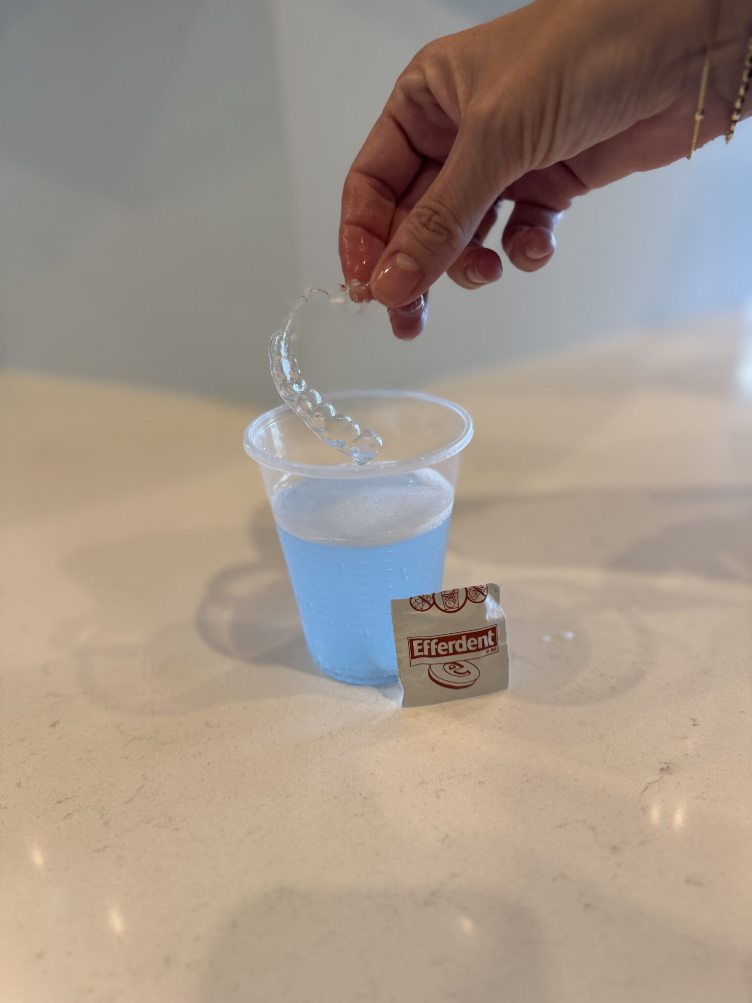 How to Clean Invisalign Aligners: Expert Tips - Freeman Orthodontics